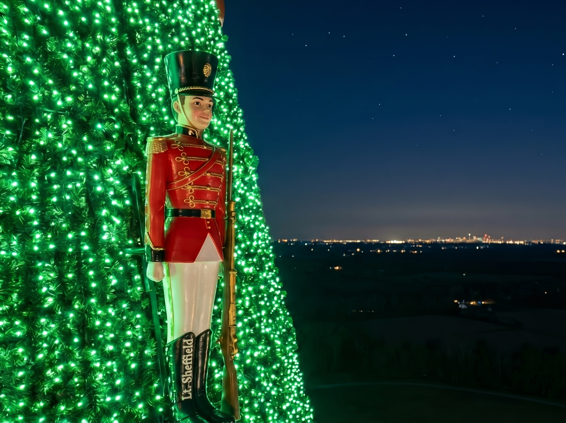 Toy Soldier ornament secured to the Glory Tree at night
